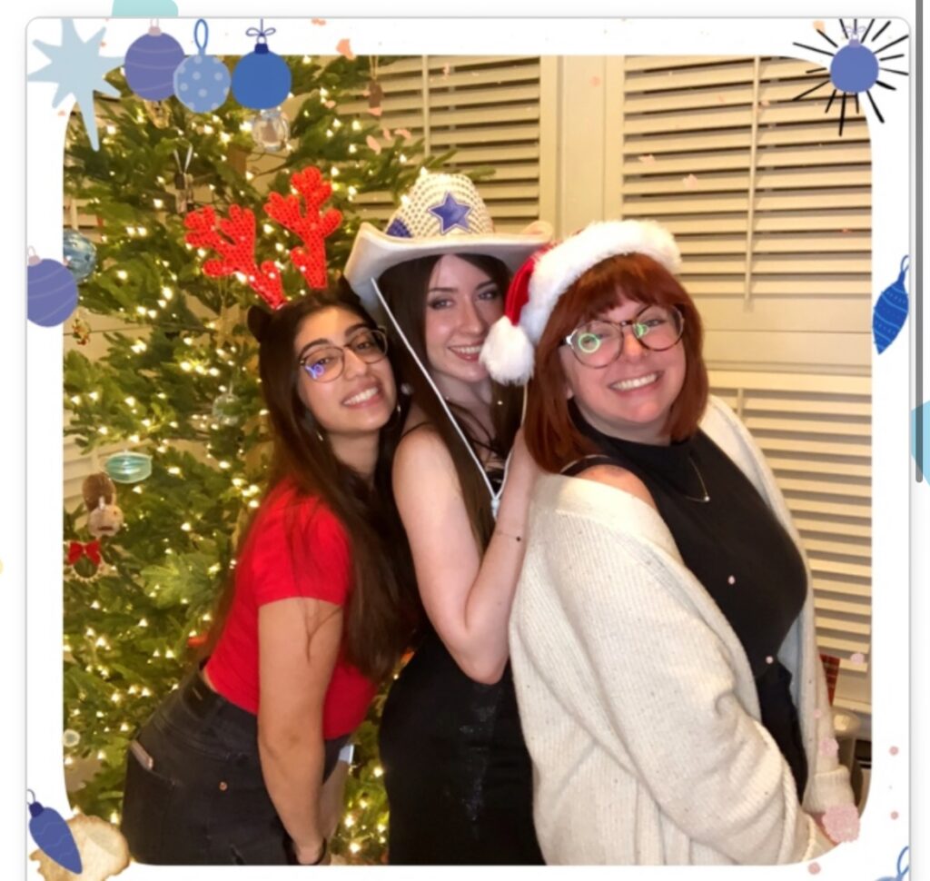 Lab members, Simran, Erica and Alice at Lab Christmas party