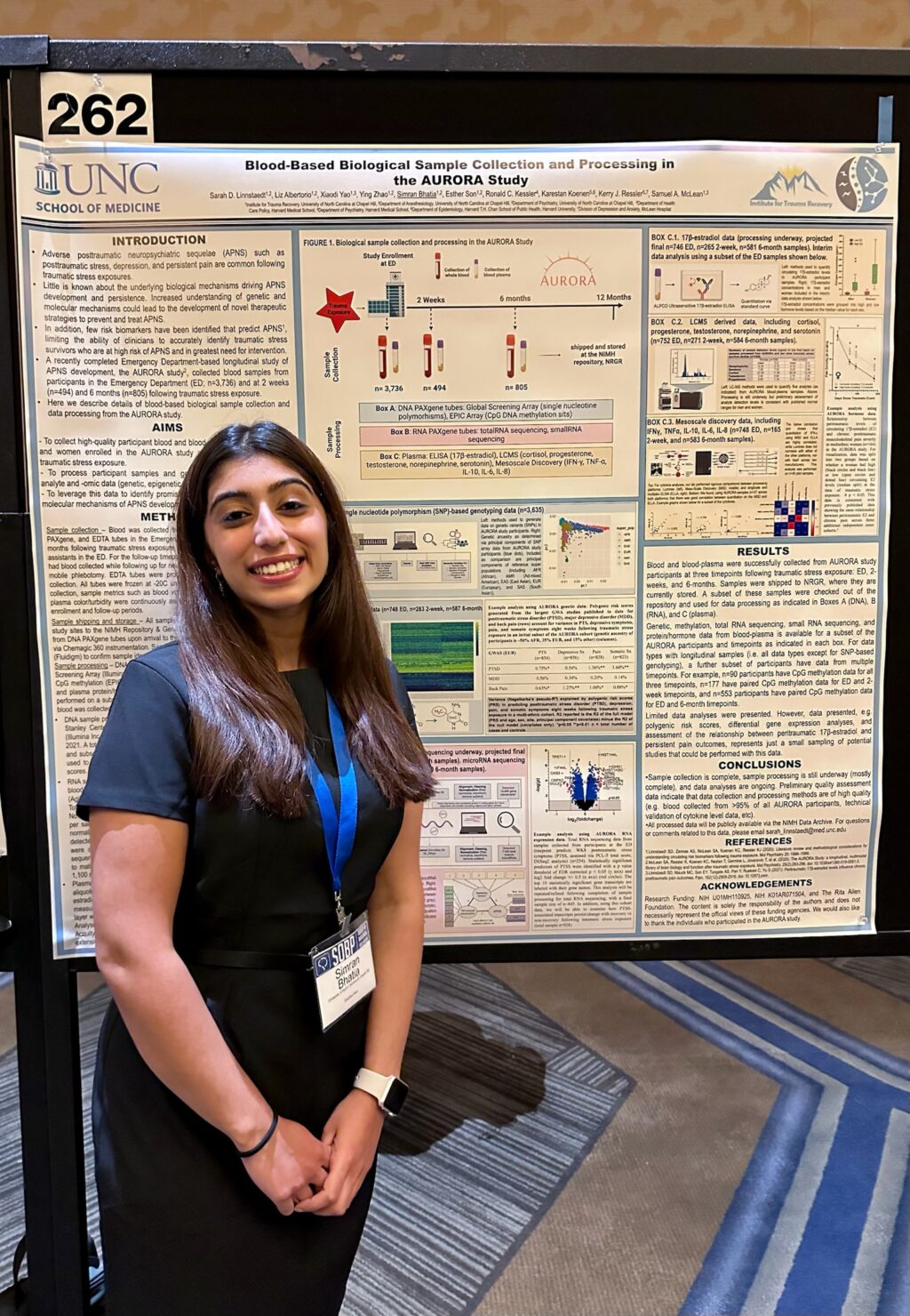 Undergraduate student, Simran Bhatia, in front of her poster presentation