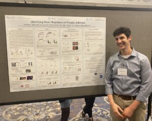 David Rocco in front of his award winning poster