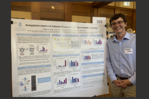 Brett Smith by his research poster