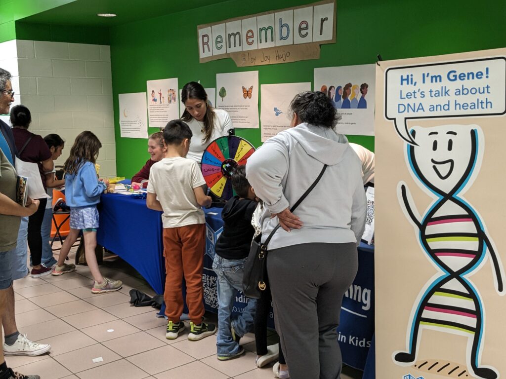ABGS researchers and educators talking to parents about DNA and genes with kids and parents 