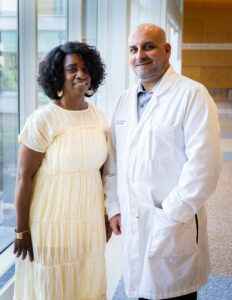 Dr. Carlos David with Essie after her brain tumor surgery.