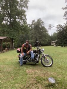 Spinal neurosurgery patient Butch on his motorcycle.