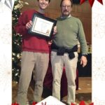 Thomas Webb receives the Pharmacology Research Staff Excellence Award from Rob Nicholas