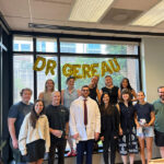 Gray Gereau, PhD, with attendees at his defense party